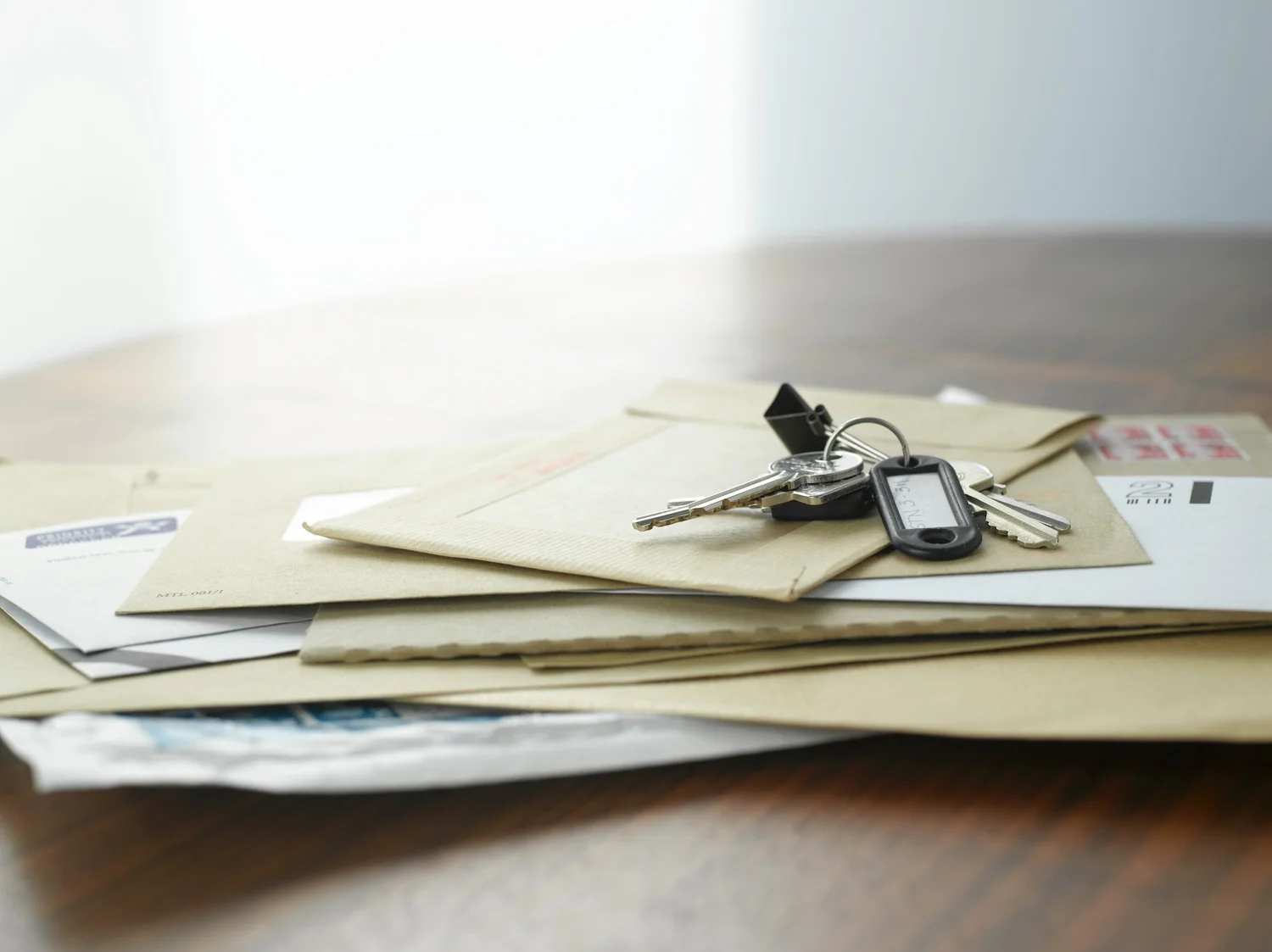 Stack of medical bills and mail